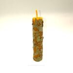 Vela ritual de cera de abeja con laurel para prosperidad