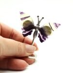 Figura de mariposa tallada en fluorita natural