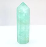 Punta de fluorita verde natural Trece Elementos